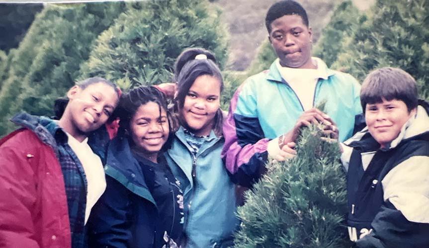 Five middle schoolers choosing a Christmas tree